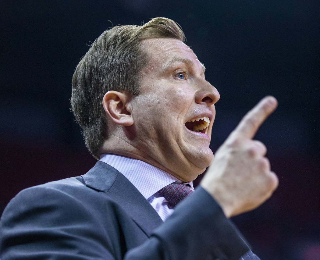 UNLV Rebels head coach T. J. Otzelberger continues to counsel his team versus the Air Force Fal ...