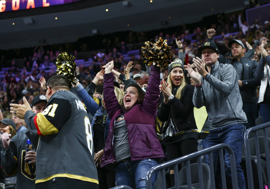 Golden Knights fans celebrate a goal by Golden Knights' Paul Stastny during the second period o ...