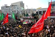In this photo provided by The Iranian Students News Agency, ISNA, flag draped coffins of Gen. Q ...