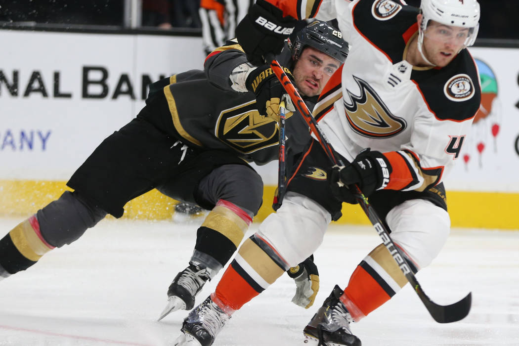 Vegas Golden Knights left wing William Carrier (28) chases Anaheim Ducks defenseman Cam Fowler ...