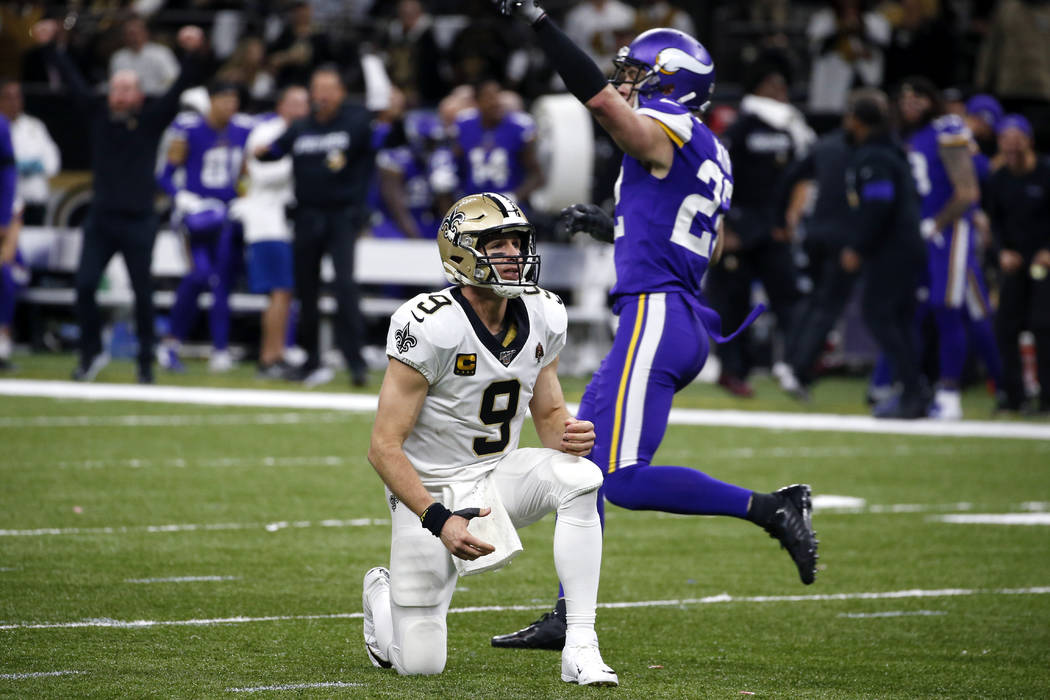 New Orleans Saints quarterback Drew Brees (9) reacts as Minnesota Vikings free safety Harrison ...