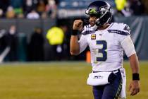 Seattle Seahawks' Russell Wilson reacts during the second half of an NFL wild-card playoff foot ...