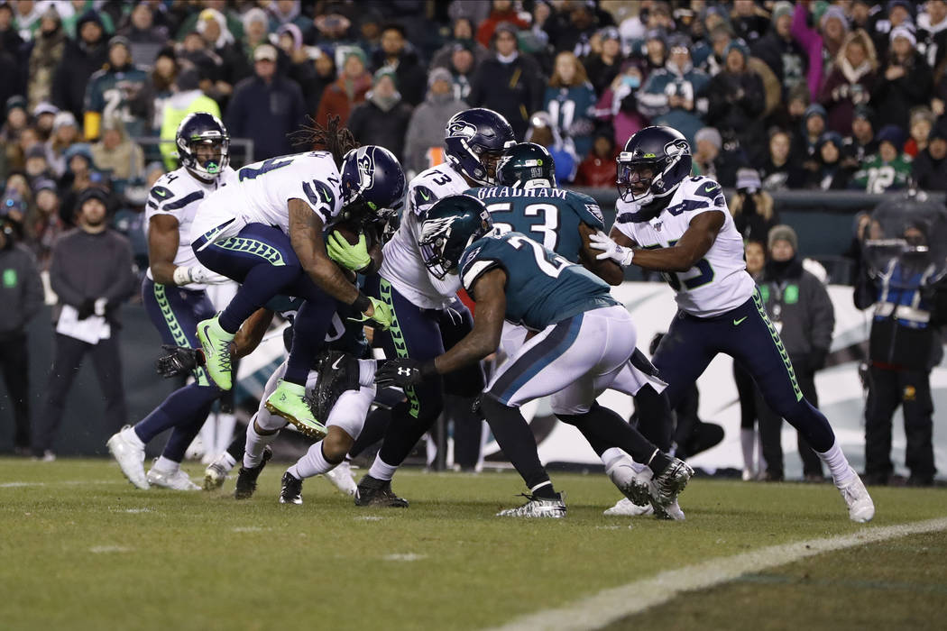 Seattle Seahawks' Marshawn Lynch (24) rushes for a touchdown against Philadelphia Eagles' Malco ...