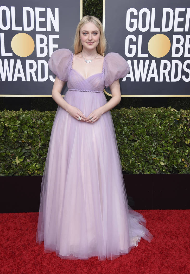 Dakota Fanning arrives at the 77th annual Golden Globe Awards at the Beverly Hilton Hotel on Su ...