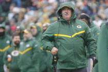 Green Bay Packers' Head Coach Mike McCarthy watches a replay during the first half of a game ag ...