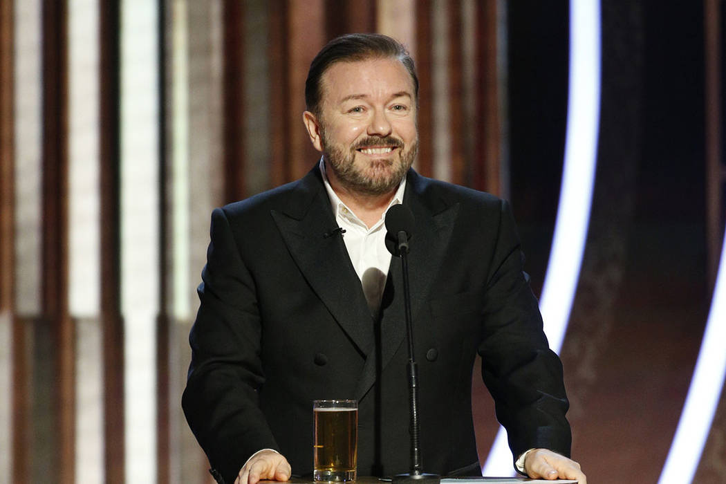 This image released by NBC shows host Ricky Gervais speaking at the 77th Annual Golden Globe Aw ...