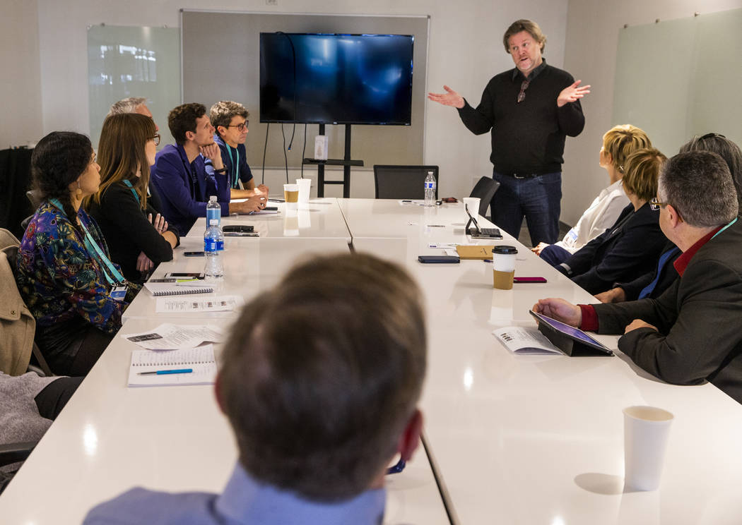 Members of the French Embassy Trade Office listen to a presentation by Mark Fancourt with Testb ...