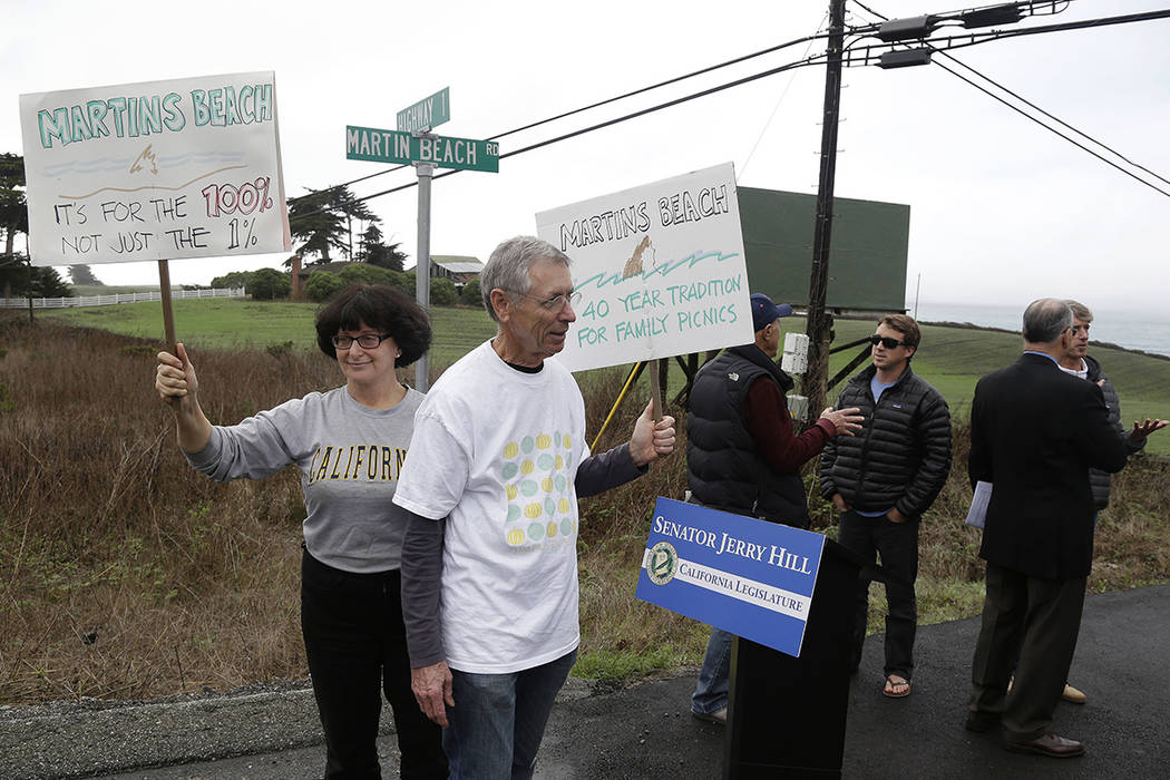 FILE - In this Feb. 10, 2014, file photo, Julie Graves, left, of Albany, Calif., and Chris Adam ...