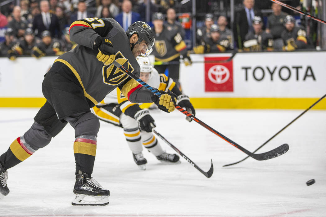 Vegas Golden Knights' Max Pacioretty (67) shoots against the Pittsburgh Penguins during the sec ...