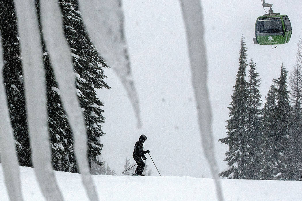 FILE - In this Feb. 25, 2013 file photo, a skier takes advantage of the snowy conditions at Sil ...
