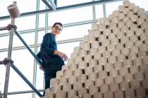 Robotics team captain and program leader Maxton Herst throws the top toilet paper roll off of t ...