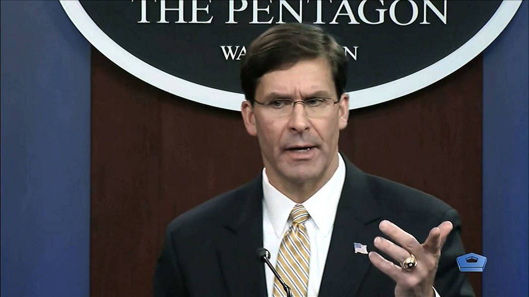 In this image from video, Secretary of Defense Mark Esper talks to the press on Iran and Iraq, ...