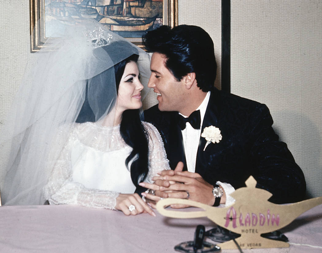 In this May 1, 1967, file photo, singer Elvis Presley and his bride, the former Priscilla Beaul ...