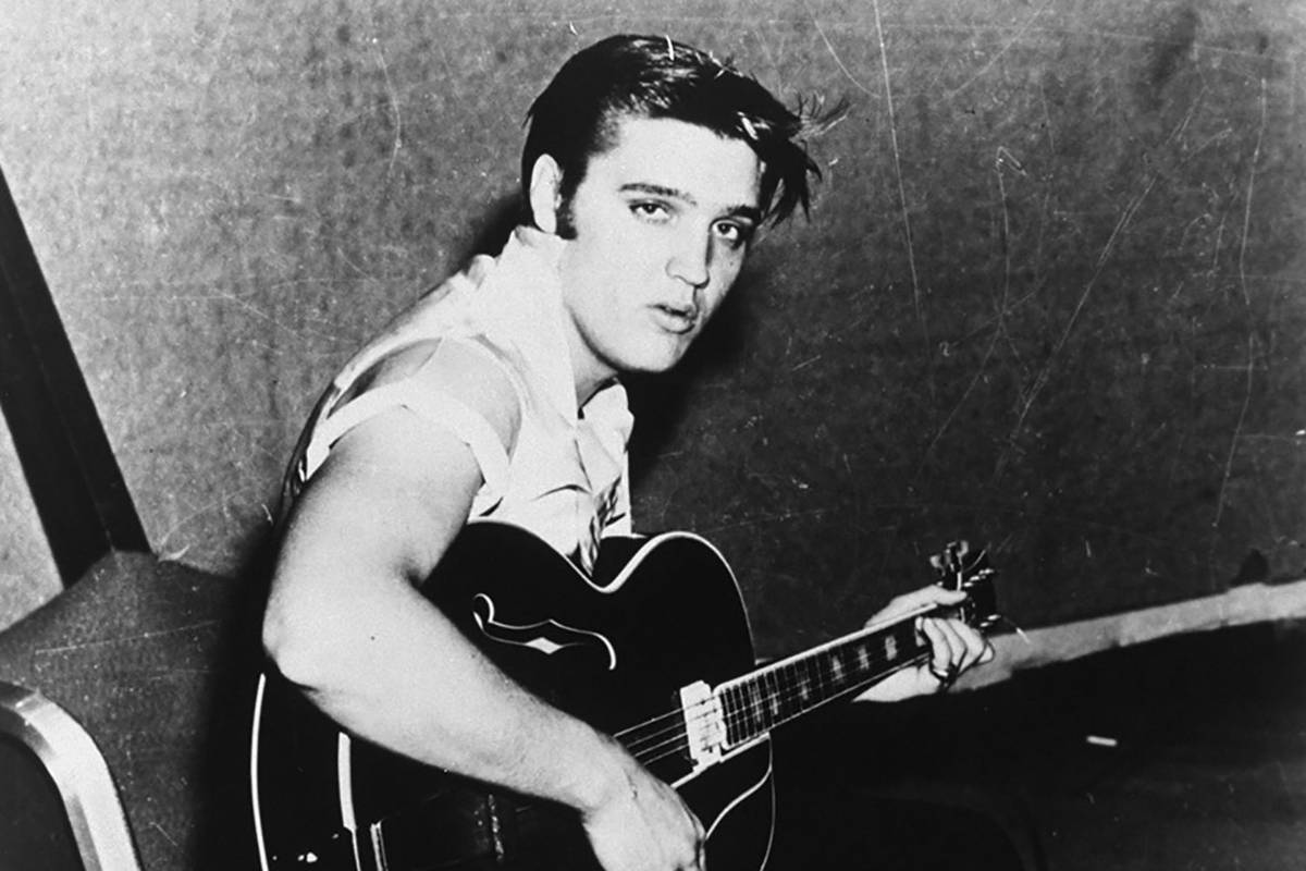 Elvis Presley is shown between takes at his first RCA Victor recording session in Nashville, Te ...