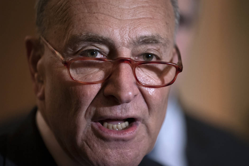 Senate Minority Leader Chuck Schumer, D-N.Y., speaks following remarks by Senate Majority Leade ...