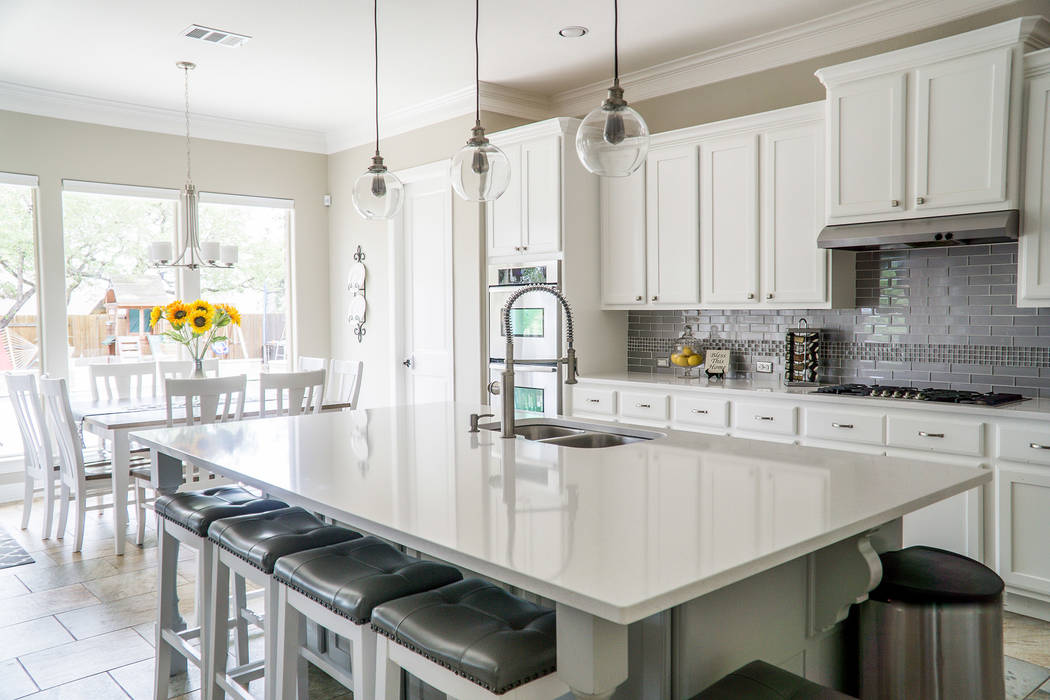 When staging a home for sale, kitchen counters need to be clean and clear of any clutter. Bring ...