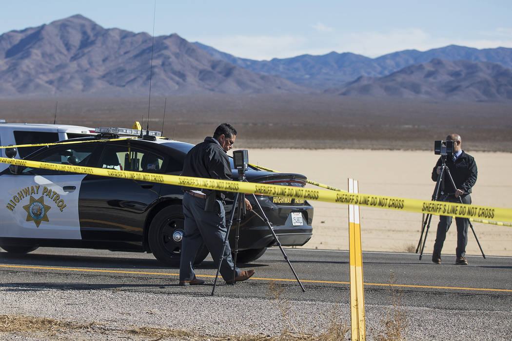 Police work the scene of a fatal officer involved shooting south of Primm on I-15 North, Wednes ...