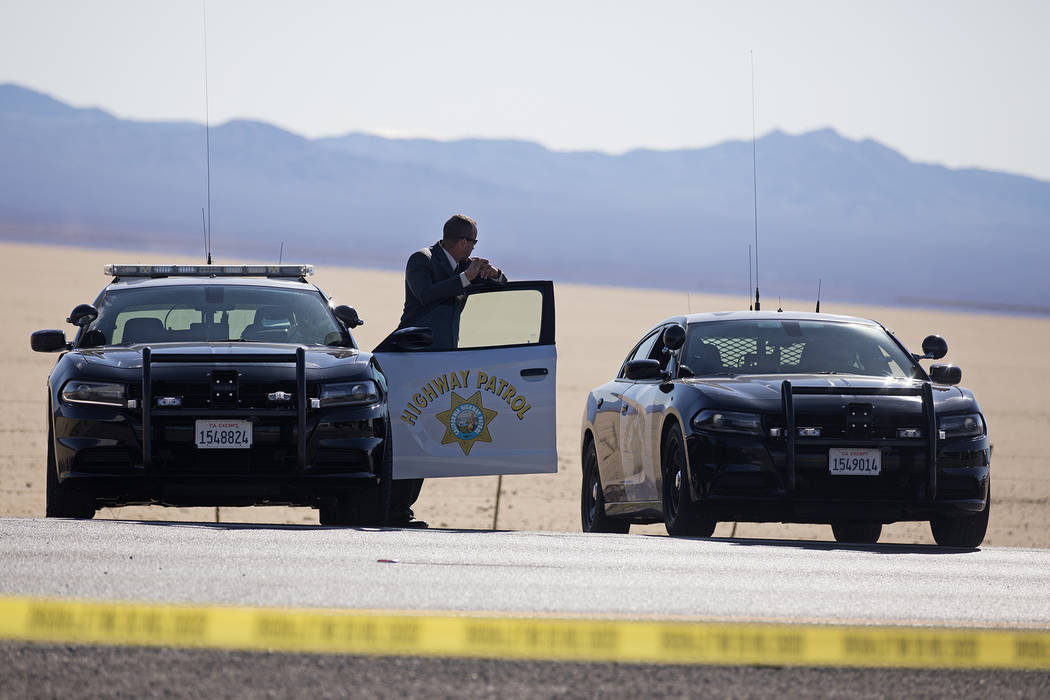 Police work the scene of a fatal officer involved shooting south of Primm on I-15 North, Wednes ...