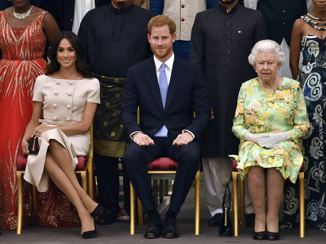 FILE - In this Tuesday, June 26, 2018 file photo Britain's Queen Elizabeth, Prince Harry and Me ...