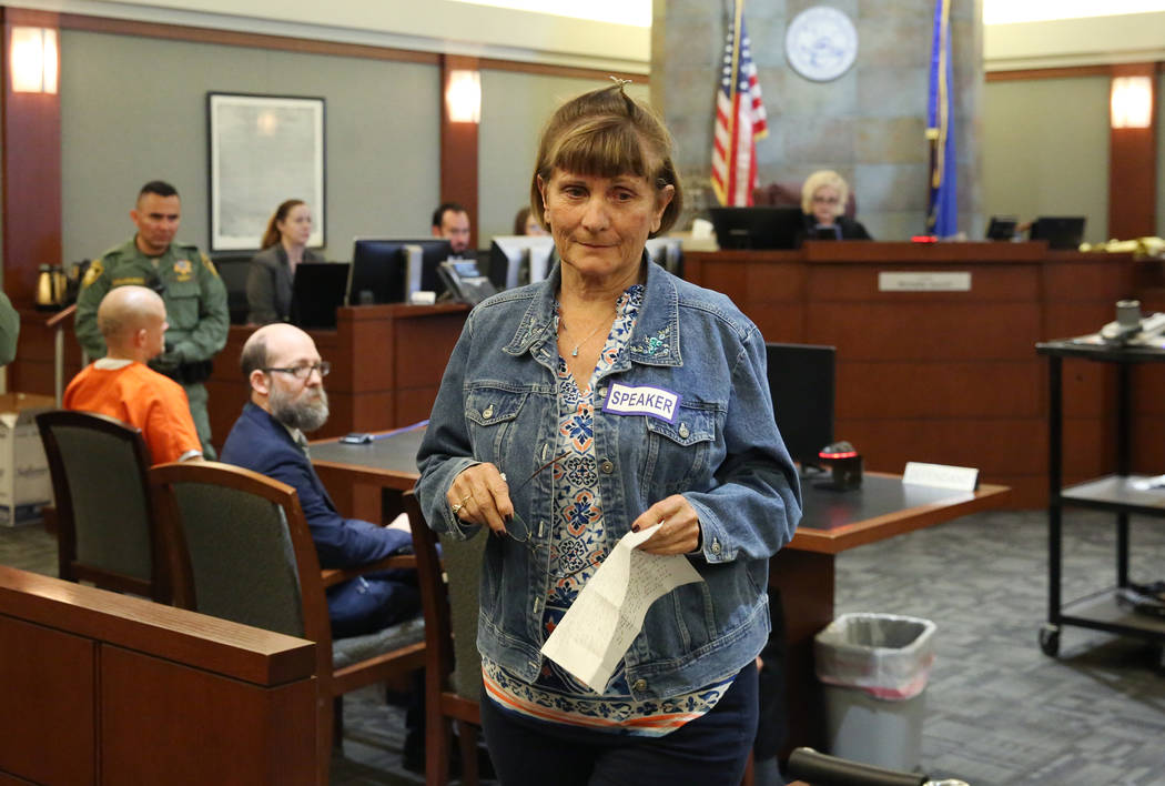 Frances Joy Portenier, daughter of a murder victim 75-year-old Jean Main, returns to her seat a ...