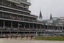 Luis Saez rides Maximum Security, right, during the 145th running of the Kentucky Derby horse r ...