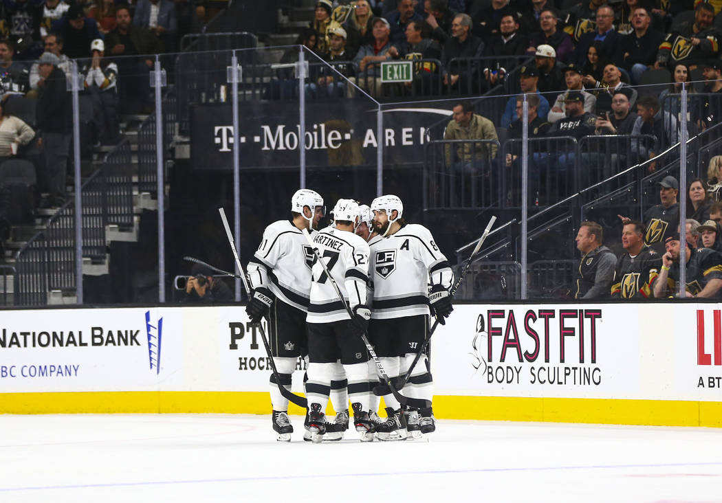 The Los Angeles Kings celebrate a goal against the Golden Knights during the first period of an ...
