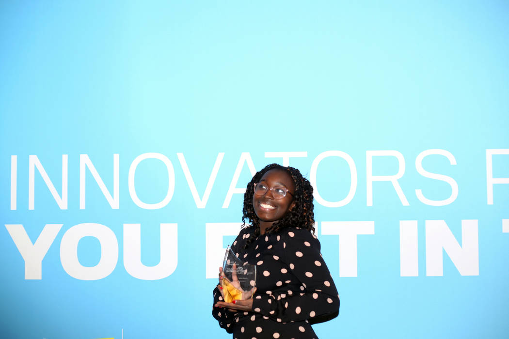 Sofia Ongele, 19, holds her Young Innovators to Watch Scholarship Program award, at the Venetia ...