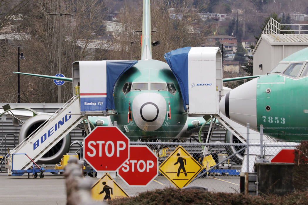 In this Monday, Dec. 16, 2019, file photo, a Boeing 737 Max jets sit parked in Renton, Wash. Ne ...