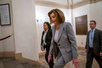 Speaker of the House Nancy Pelosi, D-Calif., arrives at the Capitol in Washington, Friday, Jan. ...