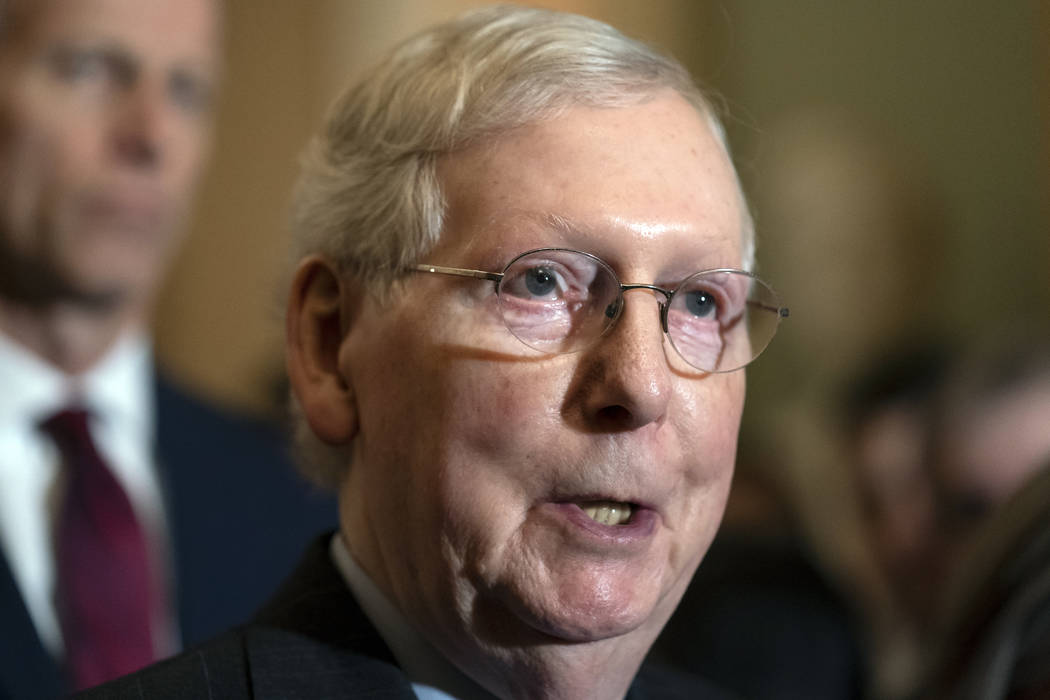 Senate Majority Leader Mitch McConnell, R-Ky., tells reporters he has secured enough Republican ...