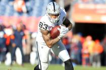 Oakland Raiders tight end Darren Waller (83) catches a ball before an NFL game against the Denv ...