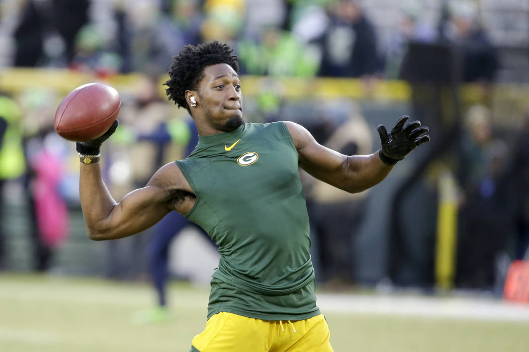 Green Bay Packers' Darnell Savage warms up before an NFL divisional playoff football game again ...