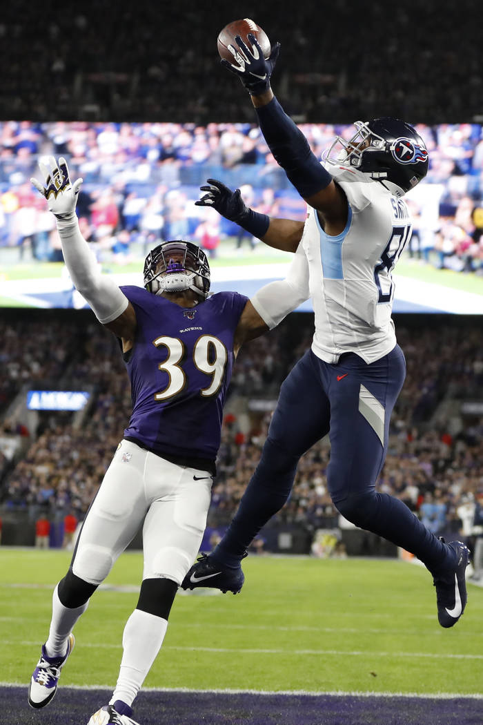 Tennessee Titans tight end Jonnu Smith (81) makes a touchdown catch against Baltimore Ravens co ...