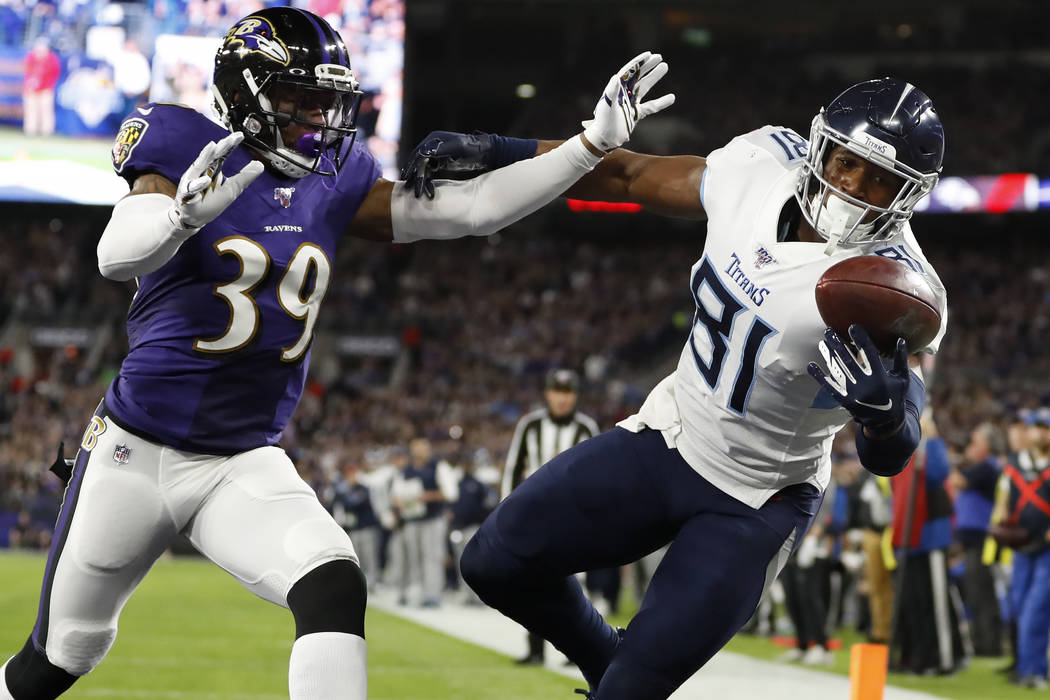 Tennessee Titans tight end Jonnu Smith (81) makes a touchdown catch against Baltimore Ravens co ...
