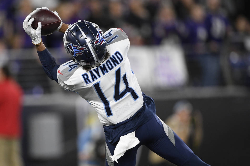 Tennessee Titans wide receiver Kalif Raymond (14) makes a touchdown catch against the Baltimore ...