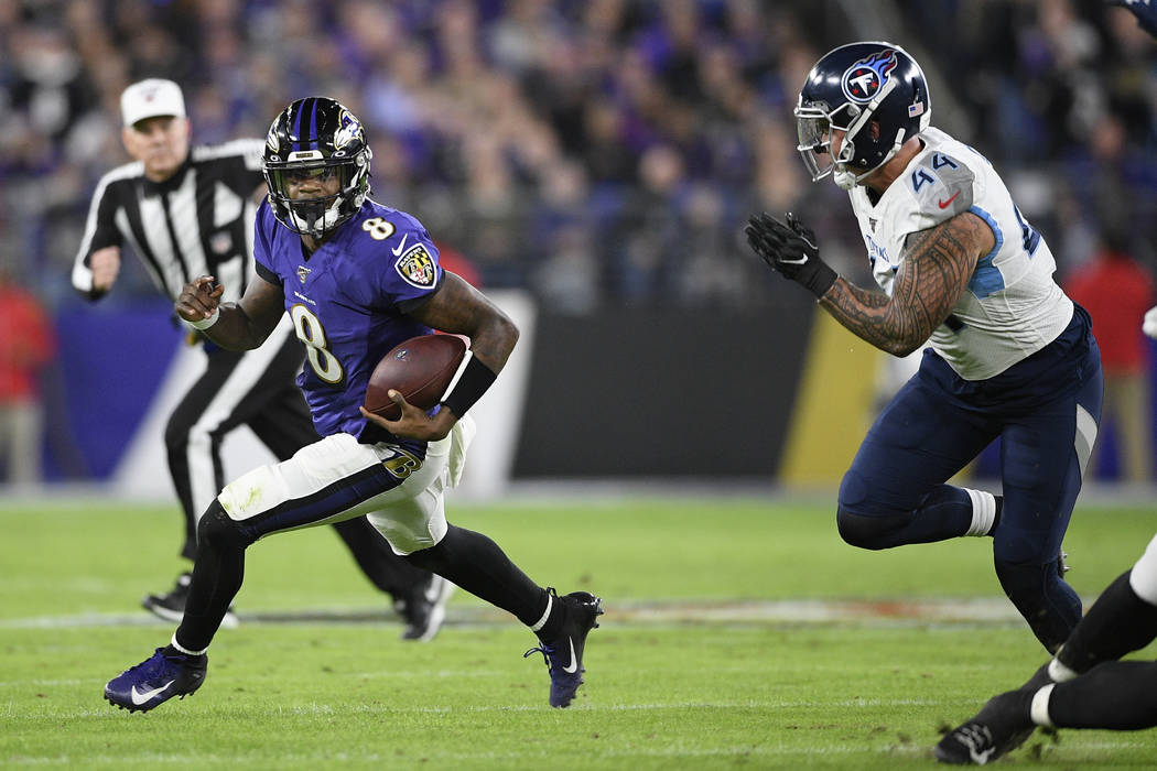 Tennessee Titans outside linebacker Kamalei Correa (44) chases Baltimore Ravens quarterback Lam ...