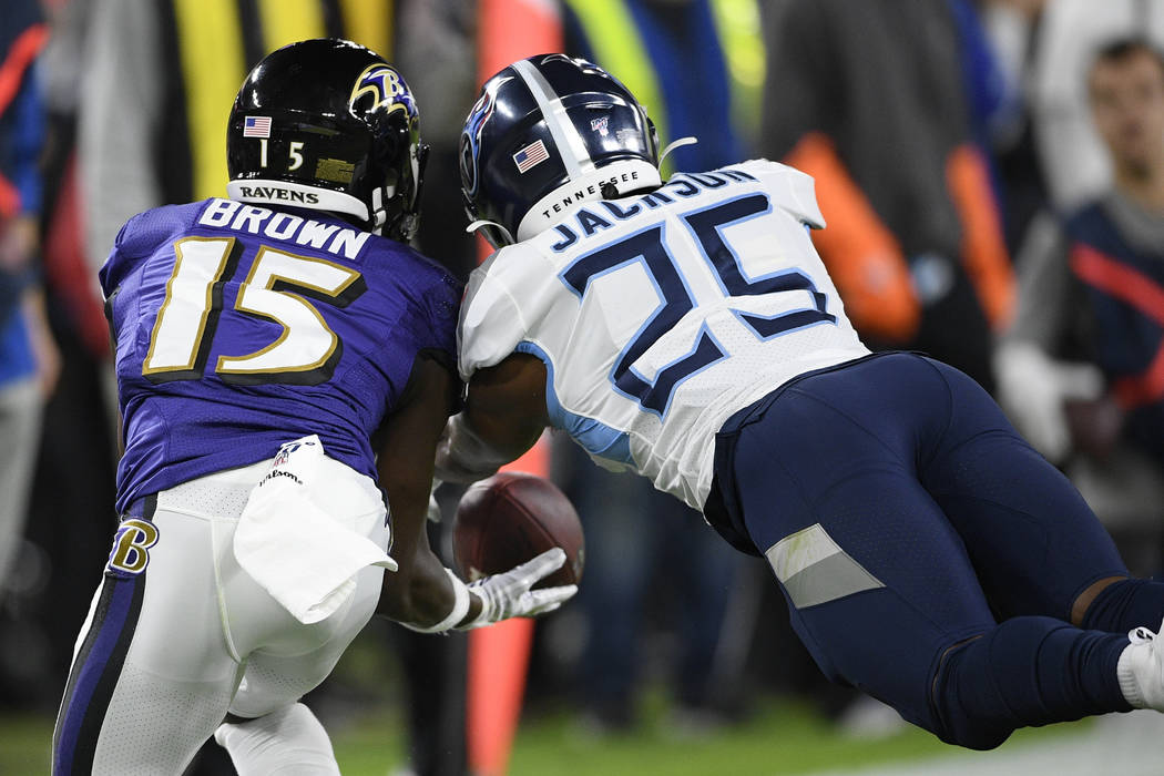 Baltimore Ravens wide receiver Marquise Brown (15) works for a catch against Tennessee Titans c ...