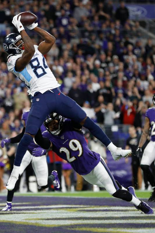 Tennessee Titans wide receiver Corey Davis (84) makes a touchdown catch against Baltimore Raven ...