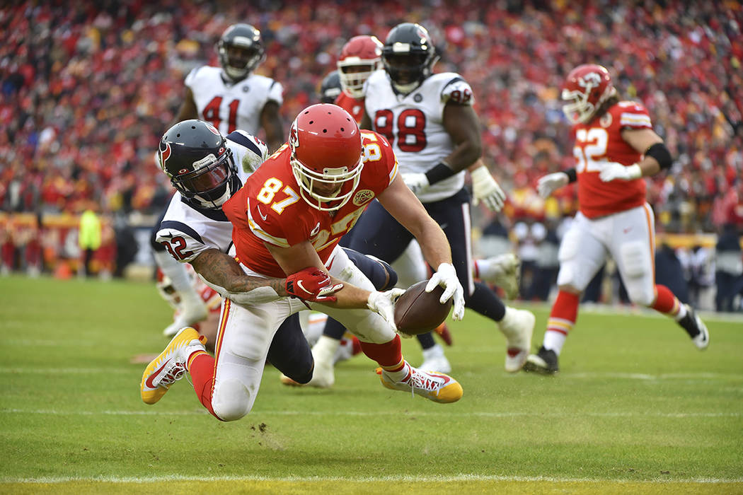 Kansas City Chiefs tight end Travis Kelce (87) scores a touchdown against Houston Texans corner ...