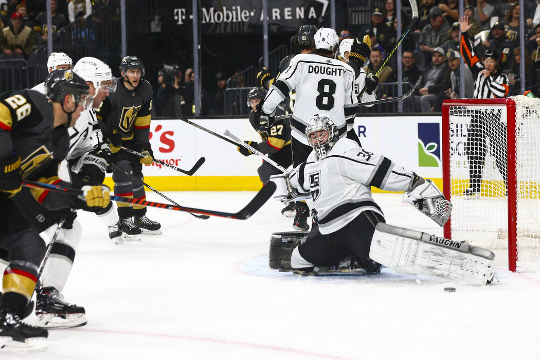 Los Angeles Kings goaltender Jack Campbell (36) blocks a shot from the Golden Knights during th ...