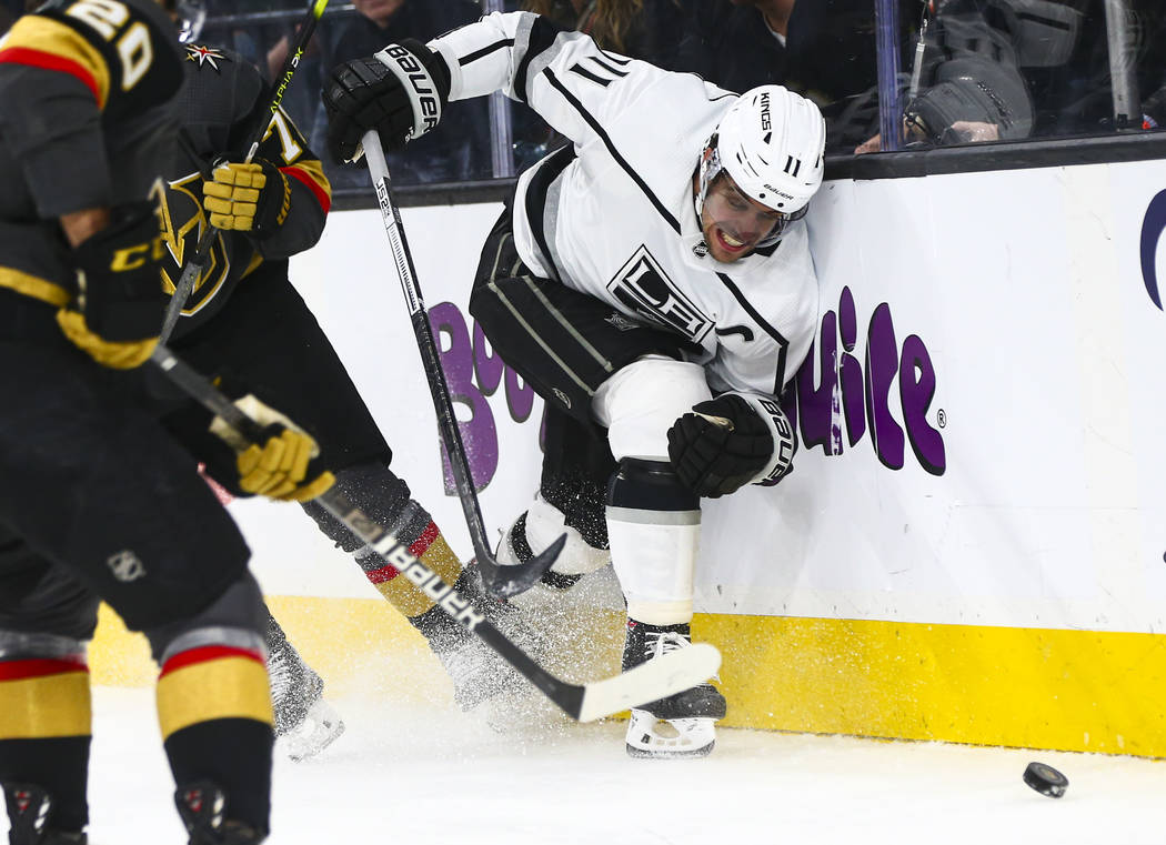 Los Angeles Kings' Anze Kopitar (11) chases after the puck against the Golden Knights during th ...