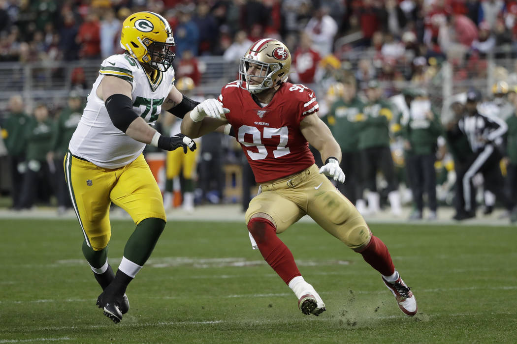 San Francisco 49ers defensive end Nick Bosa plays against Green Bay Packers offensive tackle Br ...