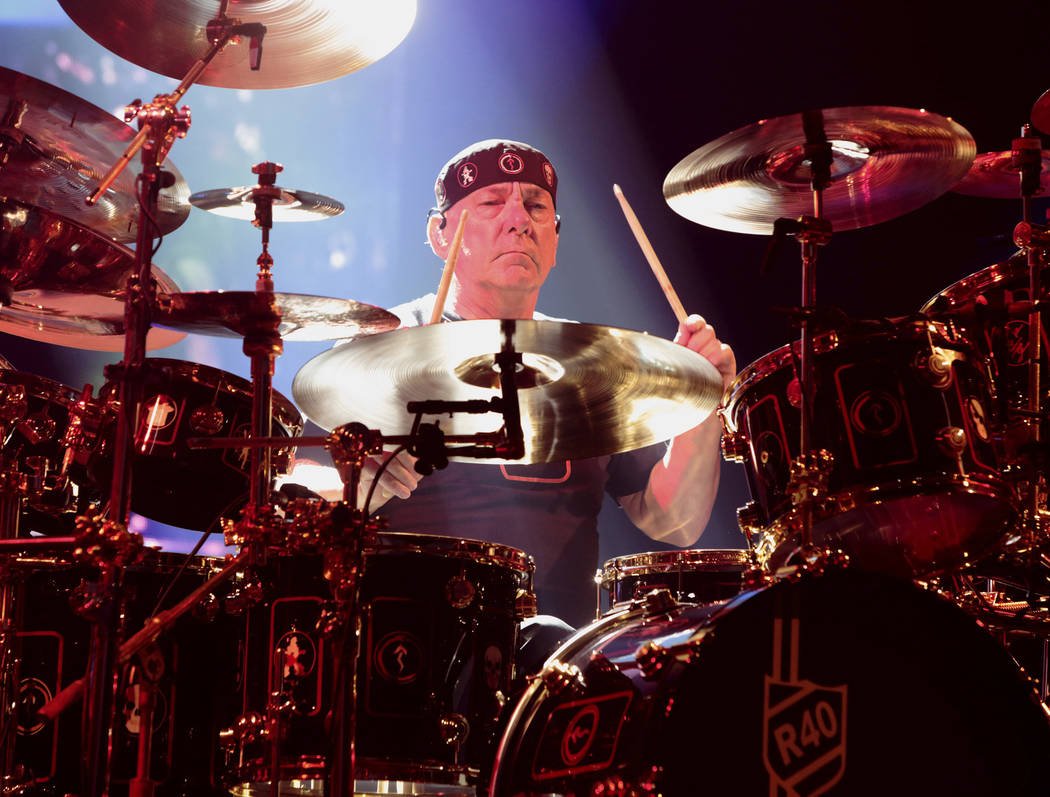 Neil Peart of the band Rush performing in concert during their R40 Live: 40th Anniversary Tour ...