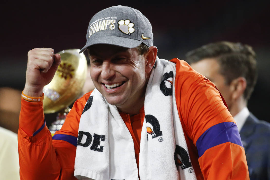 Clemson coach Dabo Swinney celebrates after Clemson defeated Ohio State 29-23 in the Fiesta Bow ...