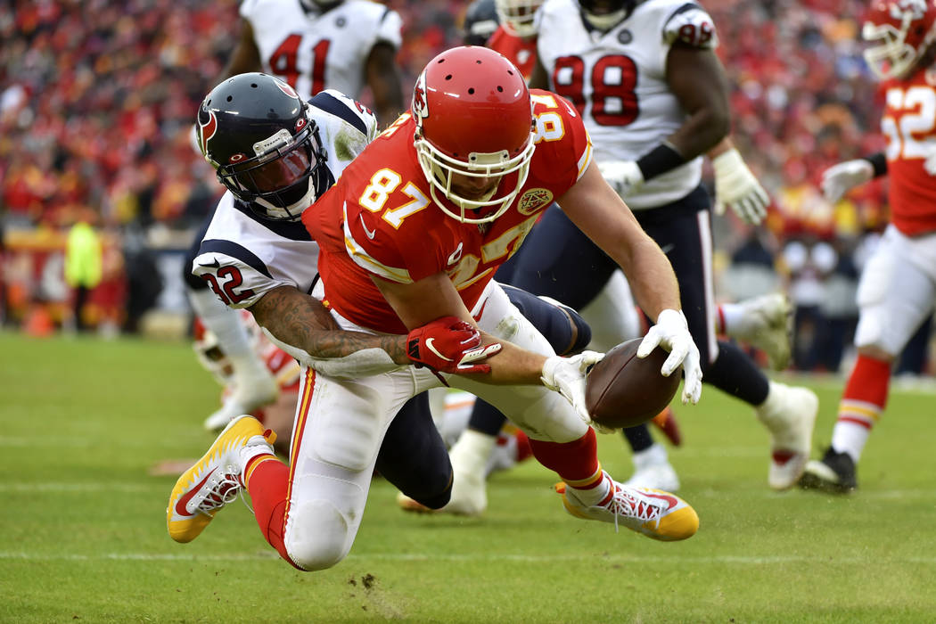Kansas City Chiefs tight end Travis Kelce (87) scores a touchdown against Houston Texans corner ...