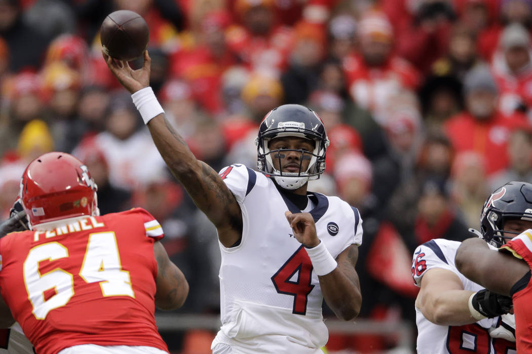 Houston Texans quarterback Deshaun Watson (4) throws a pass during the first half of an NFL div ...