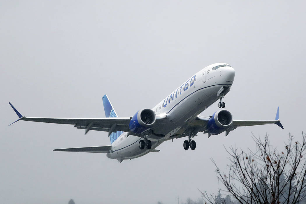 An United Airlines Boeing 737 Max airplane takes off in the rain at Renton Municipal Airport in ...