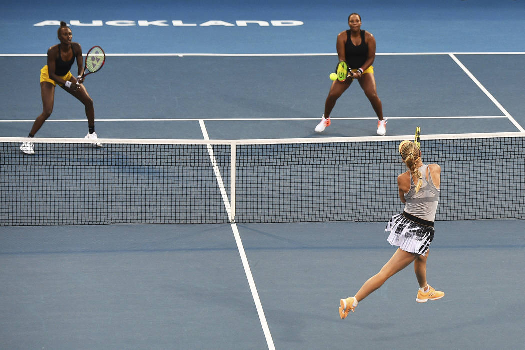 Denmark's Caroline Wozniacki plays a shoot during the finals doubles match United States Serena ...