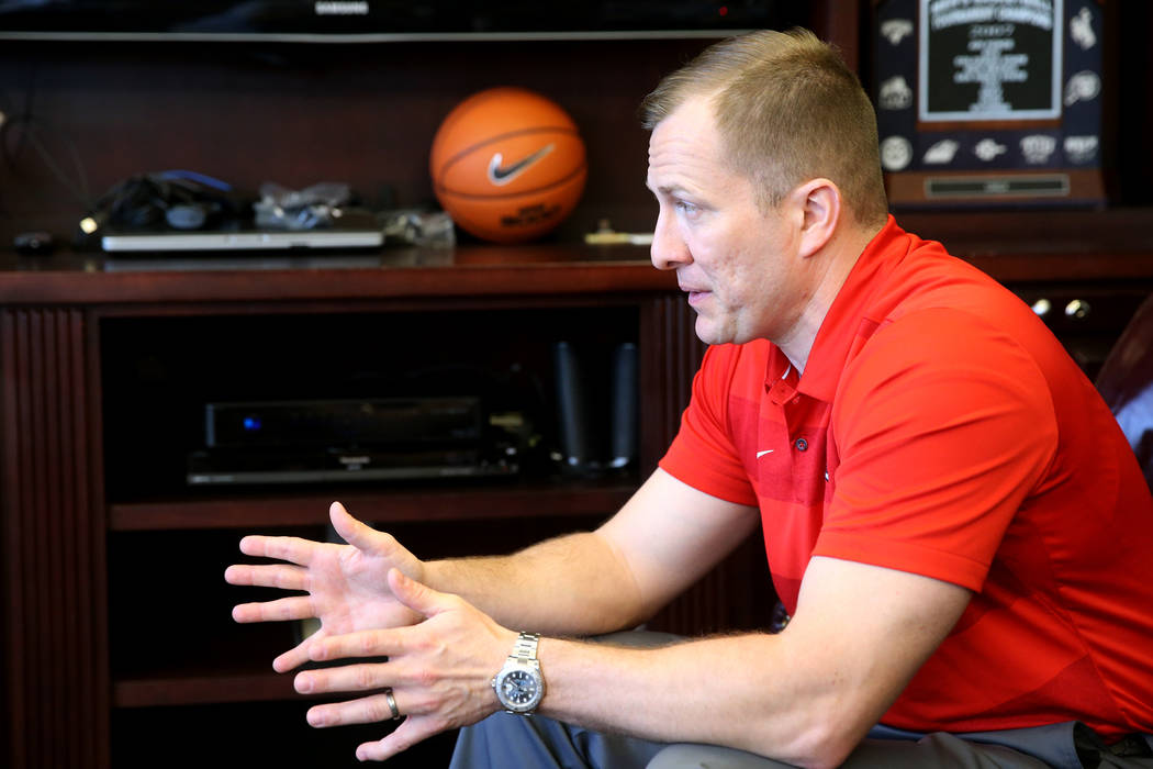 New UNLV basketball coach T.J. Otzelberger talks to a reporter in his office at the Thomas &amp ...