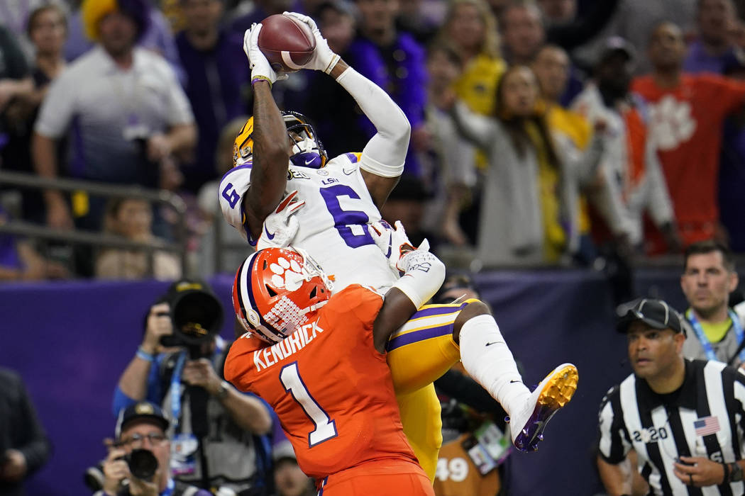 LSU wide receiver Terrace Marshall Jr. catches a touchdown pass over Clemson cornerback Derion ...